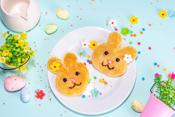 Bunny shaped pancakes Bunny shaped pancakes for cute Easter holiday, with sugar sprinkles, Funny kids breakfast or brunch bunny pancake stock pictures, royalty-free photos & images