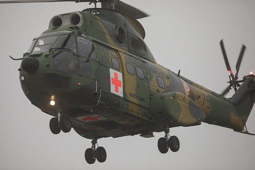 Otopeni, Romania - December 21, 2022: IAR-330 Puma military helicopter of the Romanian Air Forces in flight.