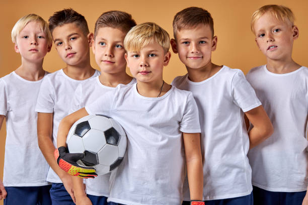 istock professional young soccer team isolated in studio 1458761696