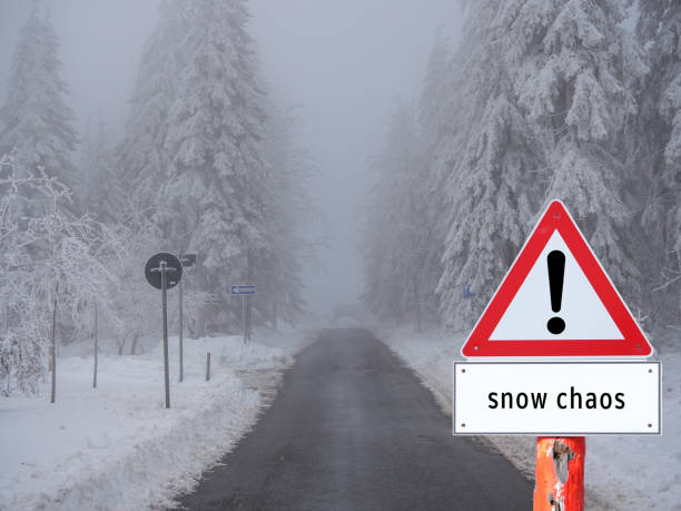 istock Warning Sign Snow Chaos on the Street 1458765018