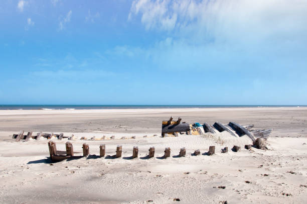 istock Photograph of an ancient shipwreck on the seafront 1458779994
