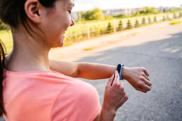 istock Young Woman Checking Pulse On Her Smartwatch After Exercising 1458780178