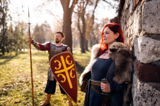 Portrait of a medieval couple, in medieval costume, in the forest