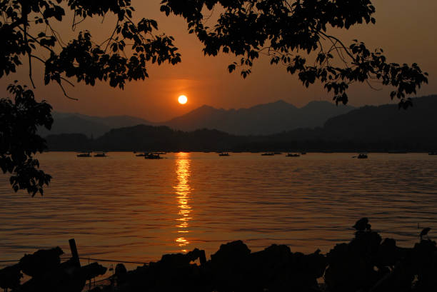 istock West Lake at sunset in Hangzhou, China 1458783081