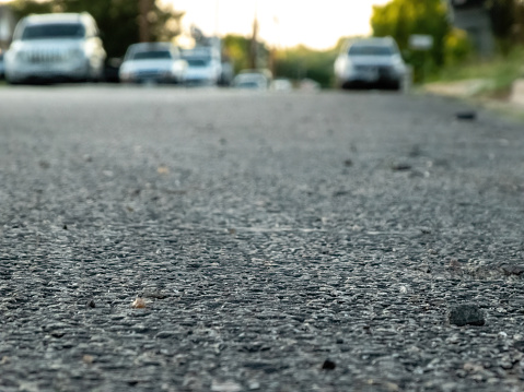 a low angle view if textured road surface