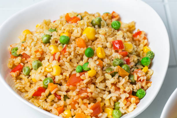 istock Bulgur with vegetables in a white plate close-u 1458790406