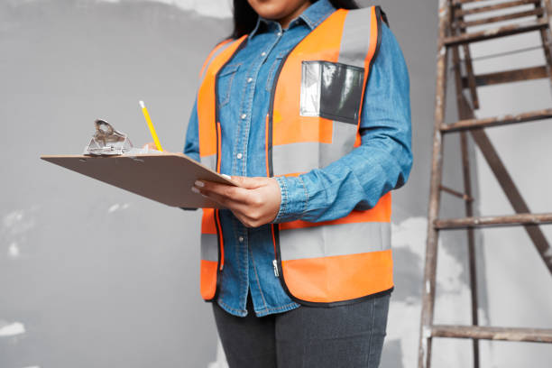 istock A construction supervisor checks renovation project with checklist on clipboard 1458793667