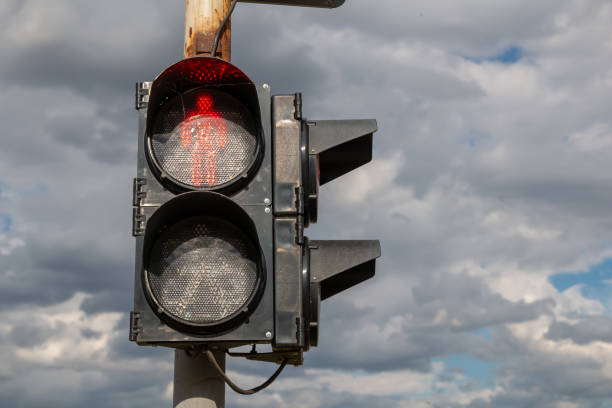 istock Red light at traffic lights for pedestrians. 1458797640