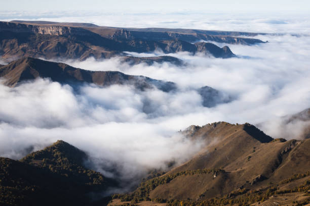 istock Photo of gorge and clouds under sunlight and clouds shadows 1458797729