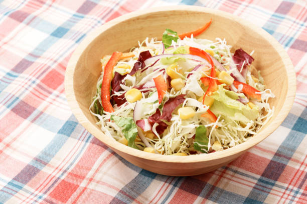 istock Shredded cabbage and colorful vegetable salad 1458797906
