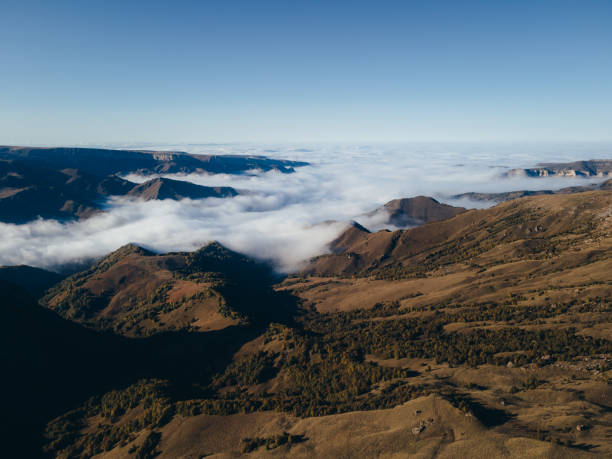 istock Photo of gorge and clouds under sunlight and clouds shadows 1458798016
