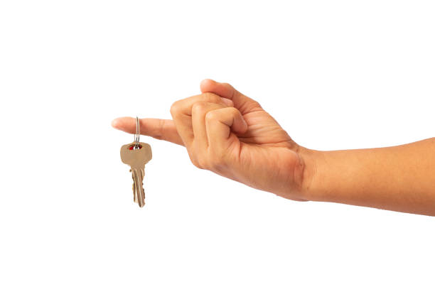 istock person holding keys with finger 1458800446