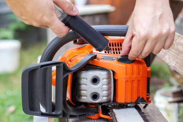 istock Refueling the chainsaw with chain oil, close-up 1458800930