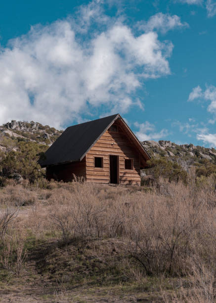 istock Old cabin hidden in the middle of the woods 1458802472