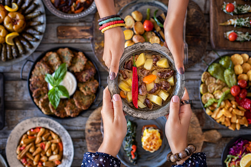 Cooked foods in the copper plate or pot.