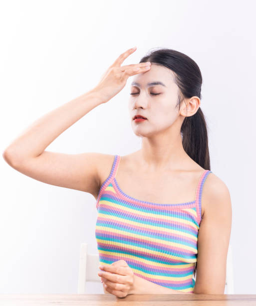 istock A woman applying a face mask 1458802619
