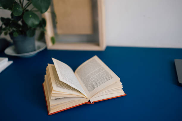 A Book Left Open In The Classroom stock photo