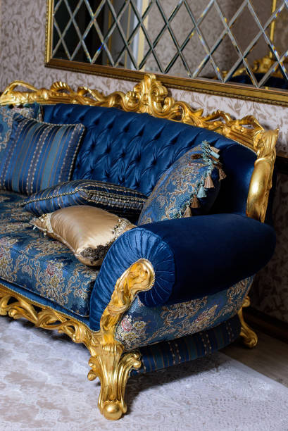 istock Luxury blue sofa with pillows. Baroque style. 1458807243