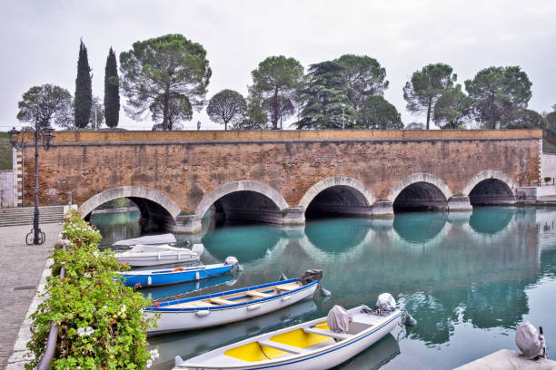 View of the canal and Volton bridge in Peschiera Del Garda, Italy.