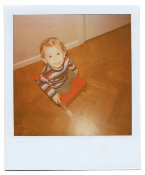istock Toddler climbing on a chair 1458810495