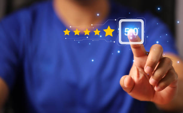 istock Customer Experience Concept man hand showing on five star excellent rating on background 1458814191