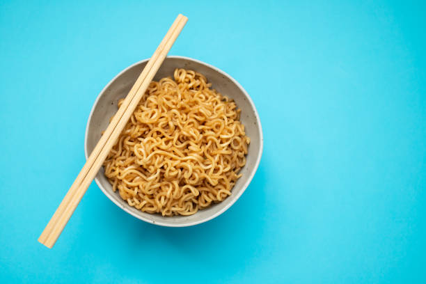 istock Fresh tasty noodles with vegetables in white bowl 1458816514