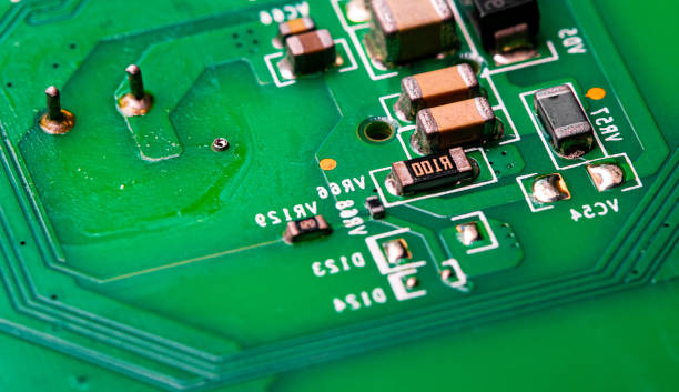istock Macro Close up of printed wiring on PC circuit board 1458820471