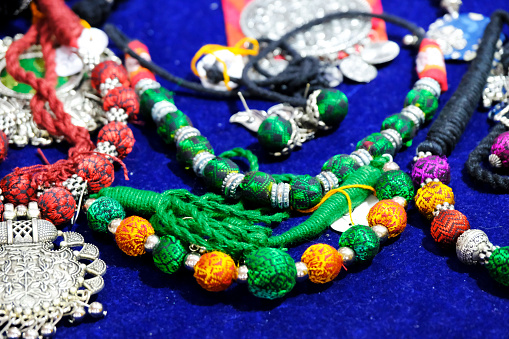 Indian Traditional jewellery displayed in a street shop for sale in Pune, Maharashtra. Indian art, Indian artificial jewelry.