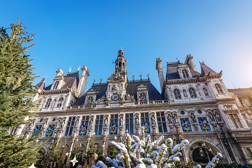 View of the Hotel de Ville, Paris, France\nsmall Christmas market on the square of the city hall