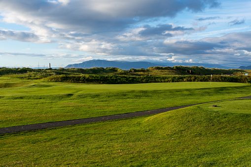 Golfcourse Seltjarnanes close to Reykjavik in Iceland and Grotta Island Lighthouse in the background