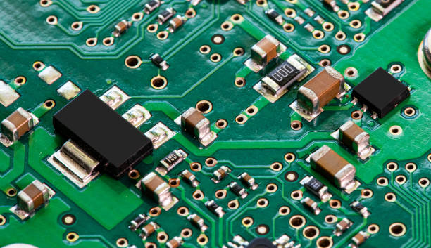 istock Macro Close up of components and microchips on PC circuit board 1458823344