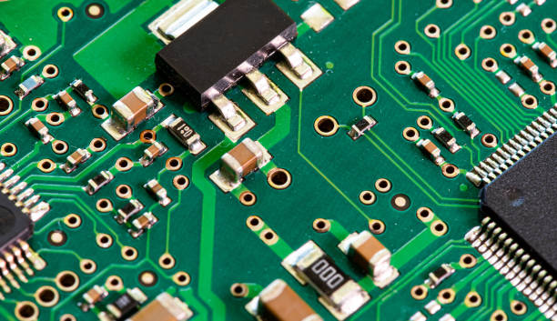 istock Macro Close up of components and microchips on PC circuit board 1458823473