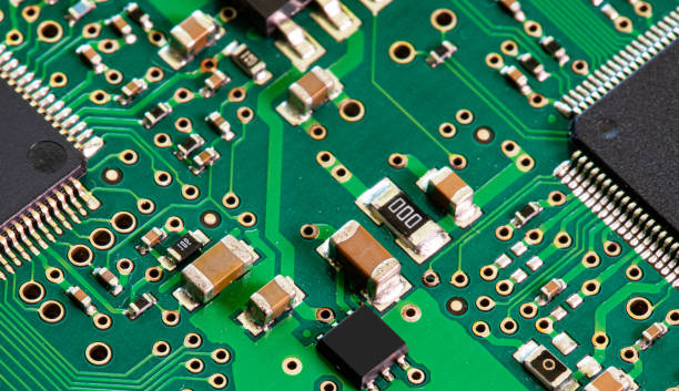 istock Macro Close up of components and microchips on PC circuit board 1458823485