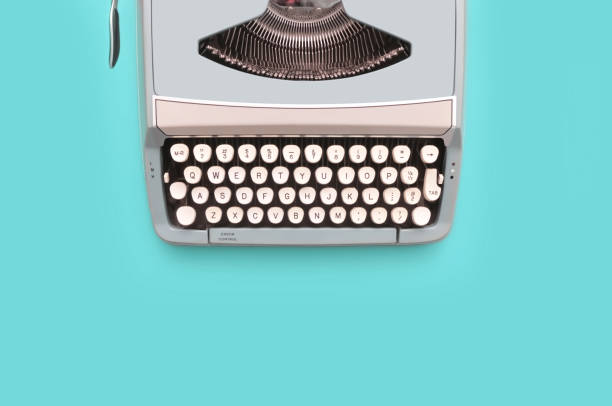 istock Overhead top view of a vintage aqua blue typewriter 1458823977