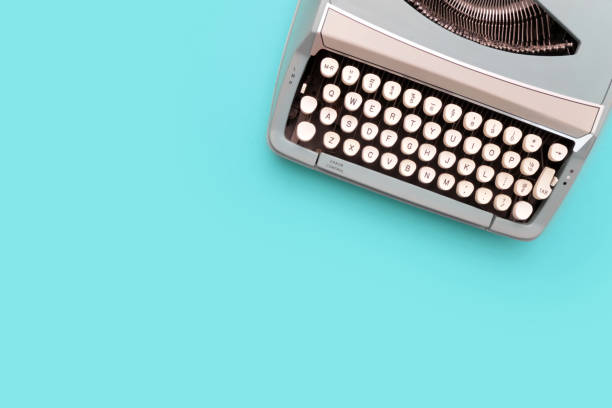 istock Overhead top view of a vintage aqua blue typewriter 1458823978