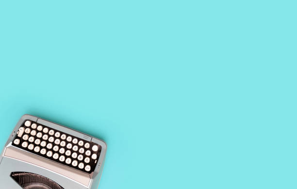 istock Overhead top view of a vintage aqua blue typewriter 1458824642