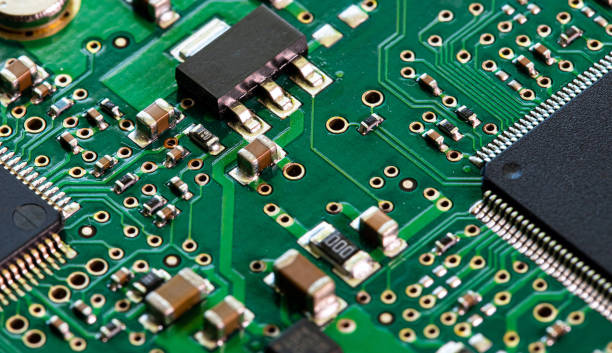 istock Macro Close up of components and microchips on PC circuit board 1458824978