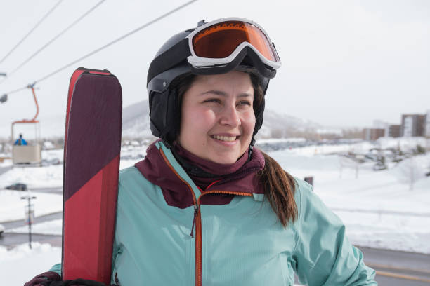 istock Girl ready to go skiing in lift 1458828596