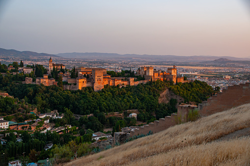 Alhambra castle at sunset with the Town View in Granada, Spain