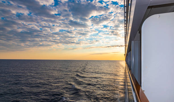 istock View from the deck of a cruise ship during a colorful sunset. 1458835181