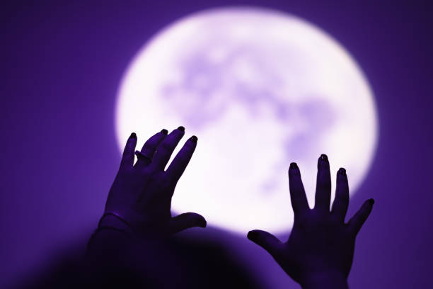 Enjoying night sky and full Moon outdoors.