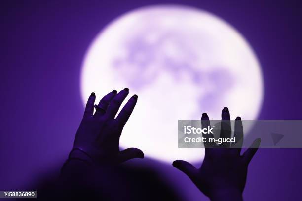 Enjoying Night Sky And Full Moon Outdoors Stock Photo - Download Image Now - Full Moon, Night, Arms Raised