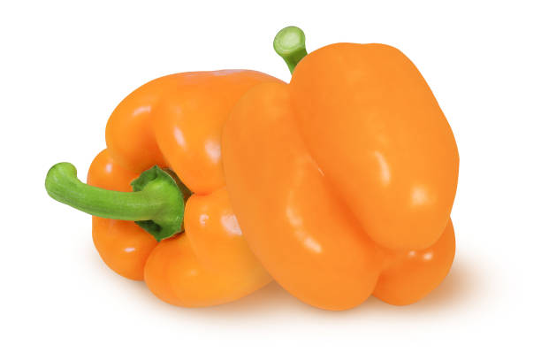 istock Orange peppers on isolated white background 1458838529