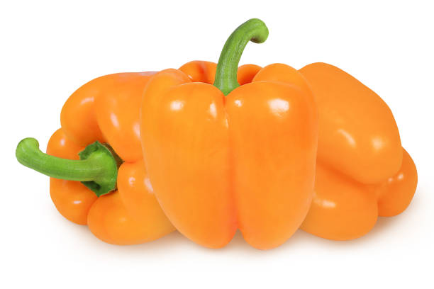 istock Orange peppers on isolated white background 1458838585