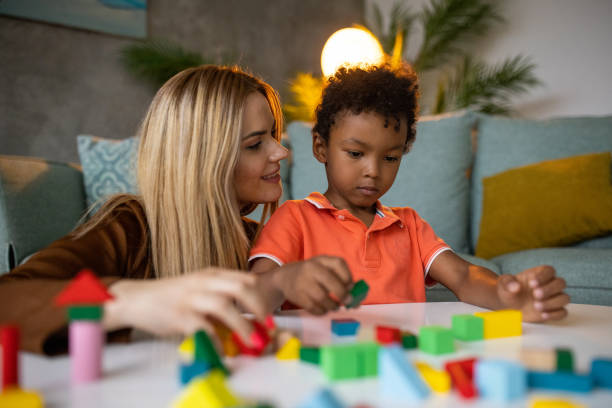 istock Mother and son playing together 1458848023