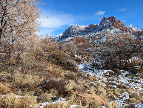 Watchman Peak with new snow near entrance to Springdale Utah and Zion National Park along town bicycle lane near Majestic View Overlook