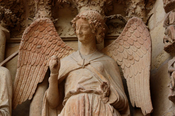 istock smiling angel at Reims Cathedral in France 1458849607