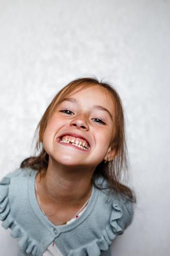 Loss of a baby tooth. a child's smile is close.