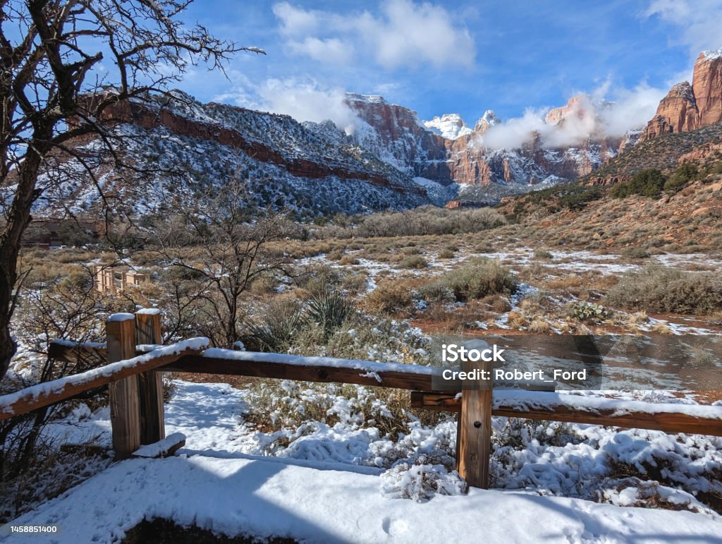 View of the West Temple and the Altar of Sacrifice after snowfall near the Human History Museum in Zion National Park Utah in winter Color Image Stock Photo