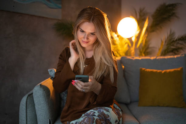 istock Woman sitting at home 1458851584